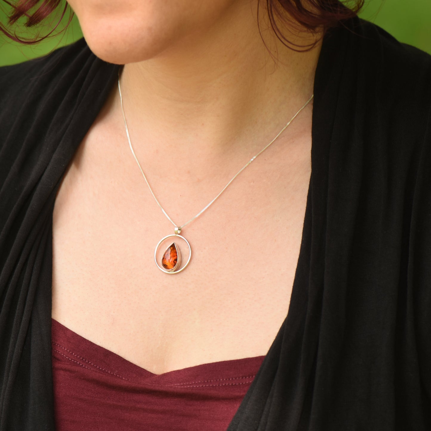 Amber in a circle Sterling Silver Pendant